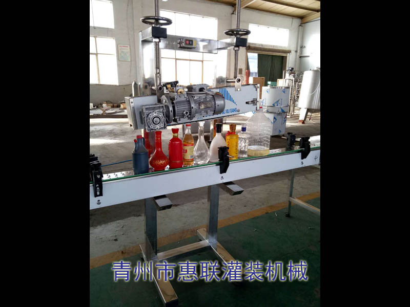 各種瓶子桶裝食用油灌裝封蓋機